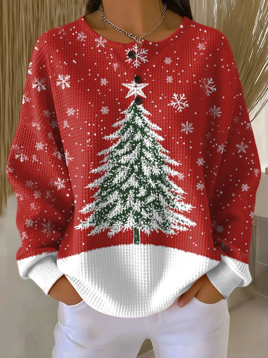 ロッテ | 赤いクリスマスセーターとクリスマスツリー