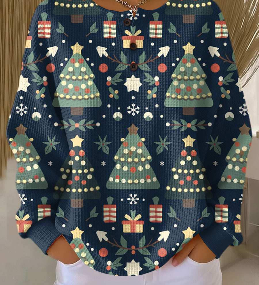 アイダ | ダークブルーのクリスマスセーターにモミの木