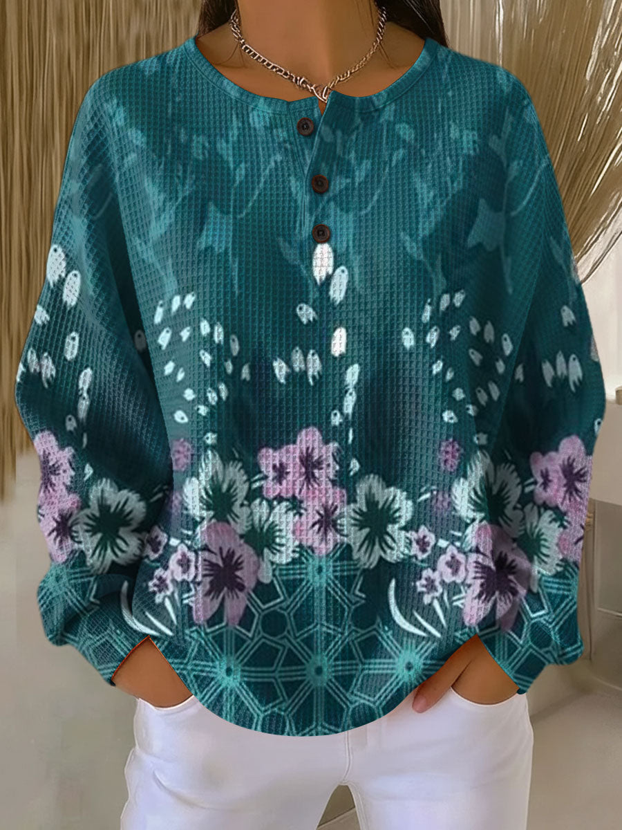 パウラ | 花柄のターコイズのプルオーバー