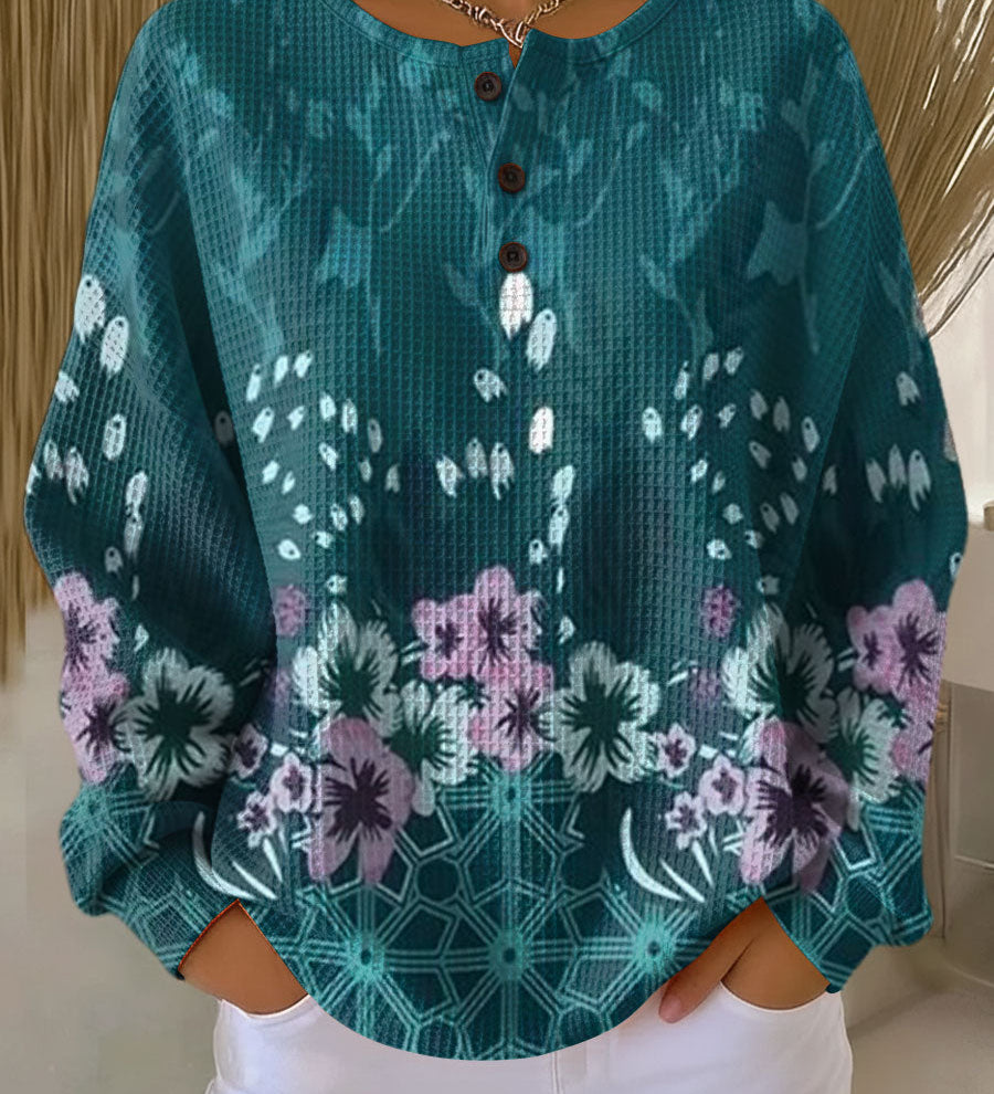 パウラ | 花柄のターコイズのプルオーバー